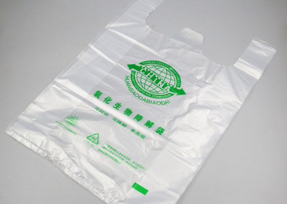 Bolso de compras plástico disponible biodegradable de la camiseta del artículo de EN13432 el 18x58cm