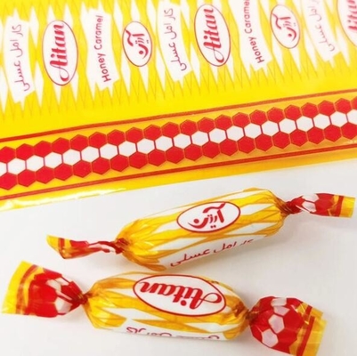 Impresión transparente de caramelos envolvente de película de torsión de PVC con colores iridiscentes del arco iris para el envoltorio de los caramelos