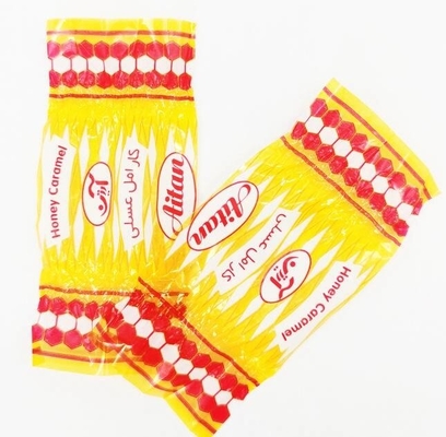 Impresión transparente de caramelos envolvente de película de torsión de PVC con colores iridiscentes del arco iris para el envoltorio de los caramelos