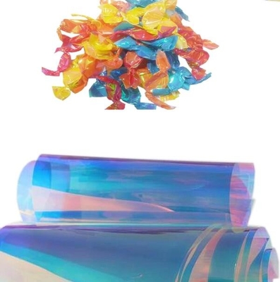 Impresión transparente de caramelos envolvente de película de torsión de PVC con colores iridiscentes del arco iris para el envoltorio de los caramelos